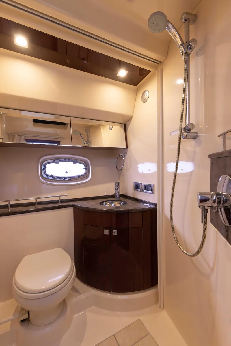 Slide: The Image of Luxurious bathroom in 2012 Sea Ray 450 Sedan yacht with shower and vanity. - 25