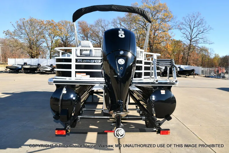 Slide: The Image of 2024 Ranger 220F pontoon boat with 150HP Mercury 4 Stroke engine, parked outdoors. - 16