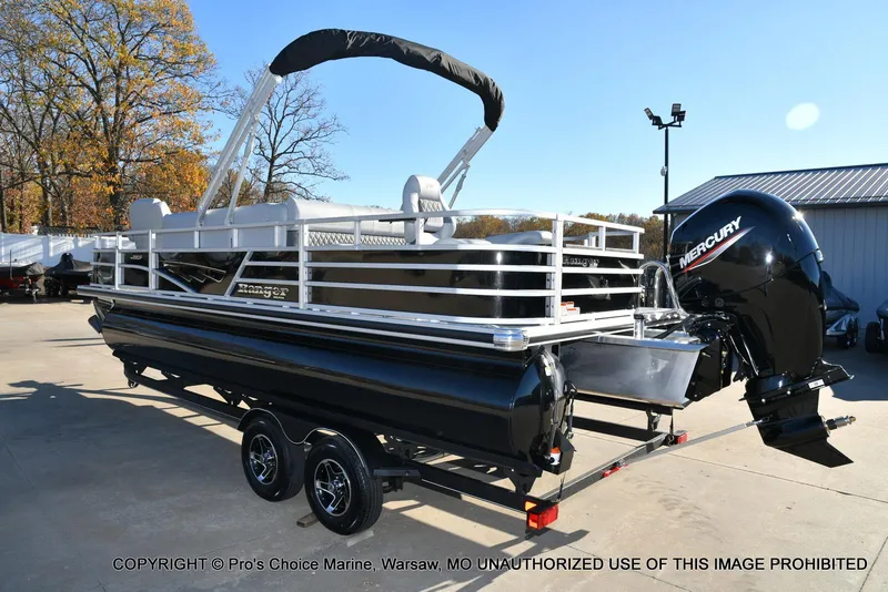 Slide: The Image of 2024 Ranger 220F pontoon boat with 150HP Mercury 4 Stroke engine on trailer. - 17