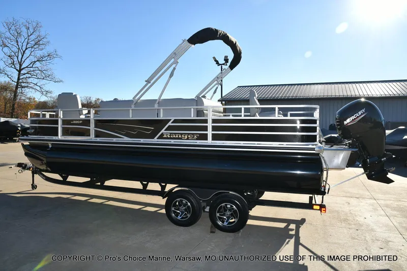Slide: The Image of 2024 Ranger 220F pontoon boat with 150HP Mercury 4 Stroke engine on trailer. - 18