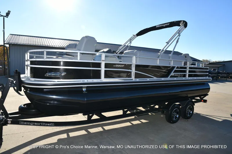 Slide: The Image of 2024 Ranger 220F pontoon boat with 150HP Mercury 4 Stroke engine on trailer. - 19
