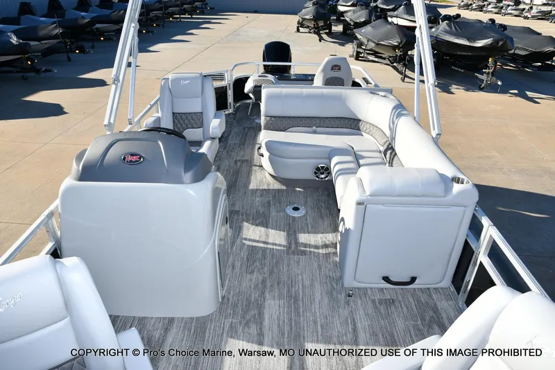 Slide: The Image of 2024 Ranger 220F boat interior with seating and steering console, featuring 150HP Mercury 4 Stroke. - 23