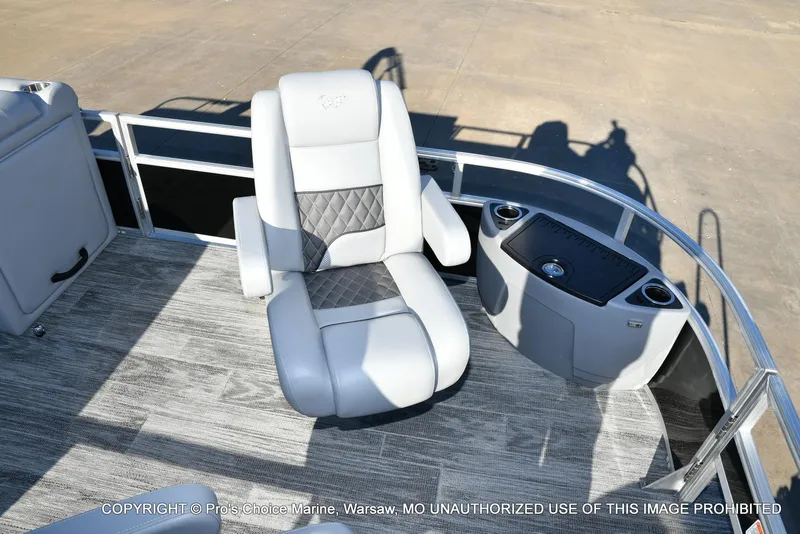 Slide: The Image of 2024 Ranger 220F boat interior with luxury seating and console. - 24