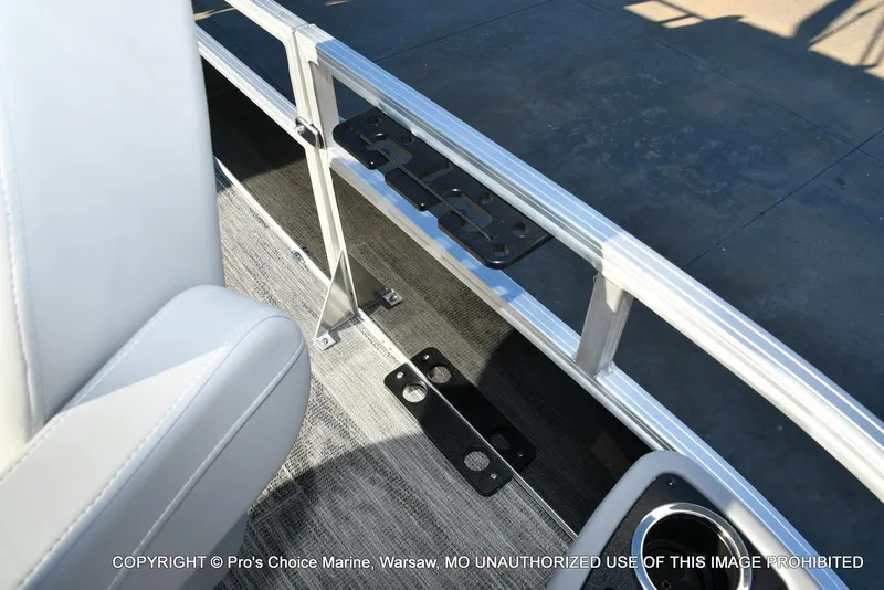 Slide: The Image of 2024 Ranger 220F boat interior with aluminum railing and seating detail. - 25
