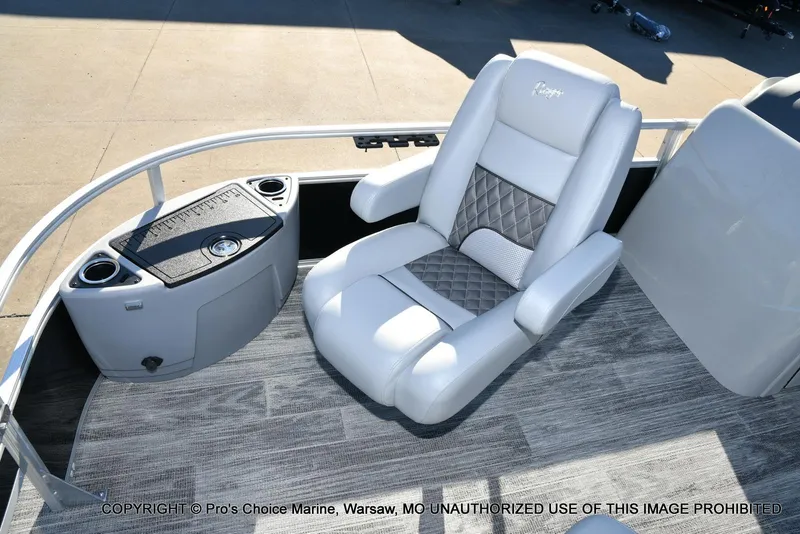 Slide: The Image of 2024 Ranger 220F boat interior with luxury seating and console, featuring modern design elements. - 29