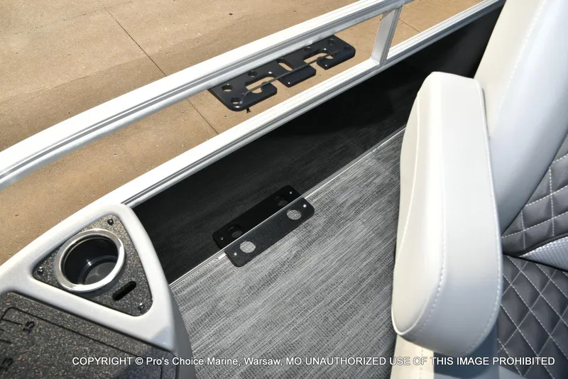 Slide: The Image of 2024 Ranger 220F boat interior with cup holder and seating detail. - 31