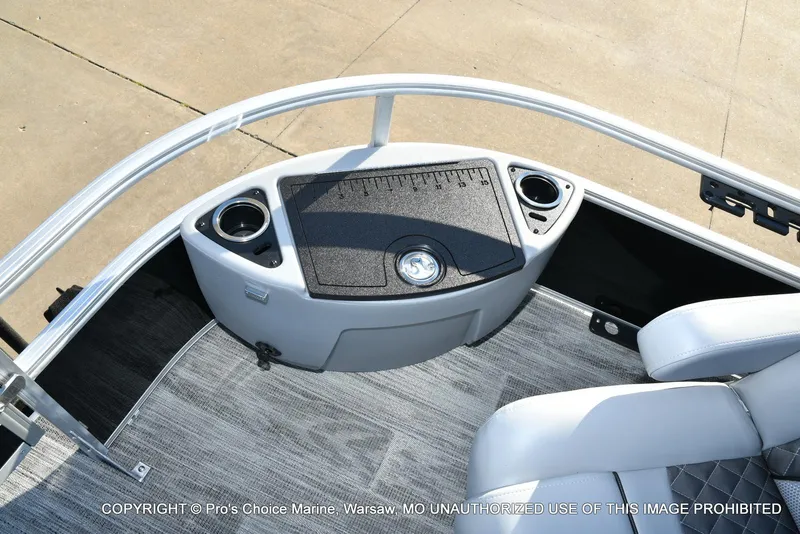 Slide: The Image of 2024 Ranger 220F boat interior with seating and cup holders. - 32