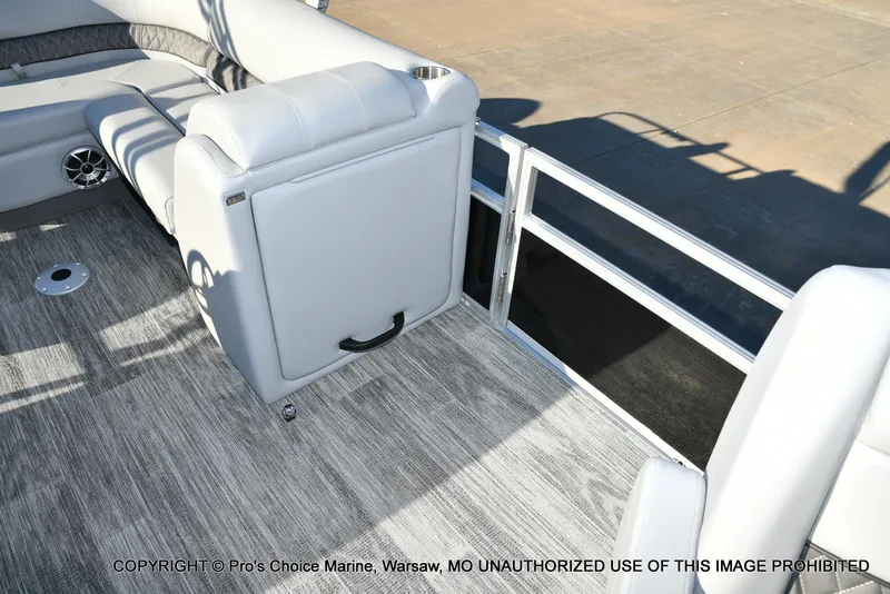 Slide: The Image of 2024 Ranger 220F boat interior with gray seating and flooring. - 35