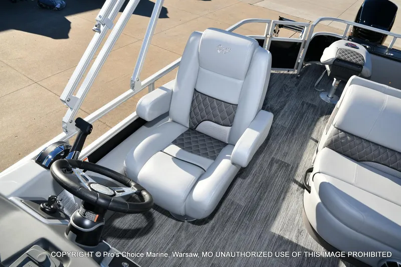 Slide: The Image of 2024 Ranger 220F boat interior with steering wheel and seating, featuring 150HP Mercury 4 Stroke. - 38