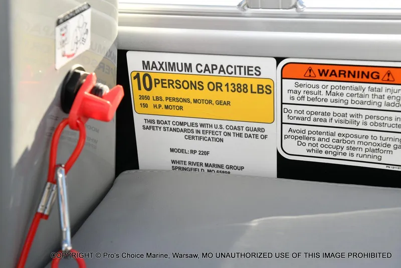 Slide: The Image of 2024 Ranger 220F boat capacity label, 10 persons or 1388 lbs, safety warnings visible. - 39