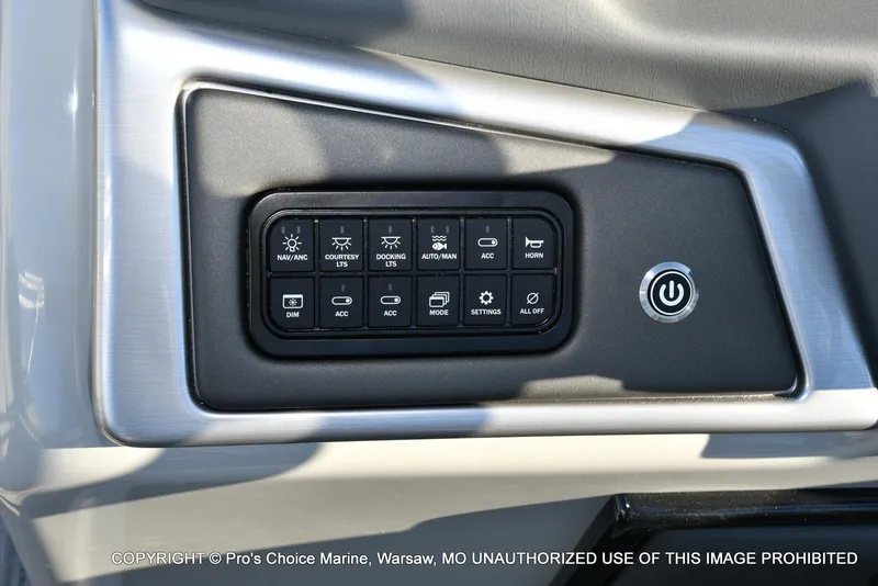 Slide: The Image of Control panel of 2024 Ranger 220F boat with various function buttons. - 42