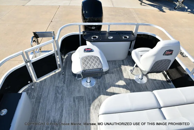 Slide: The Image of 2024 Ranger 220F boat interior with seating and Mercury 150HP engine. - 48