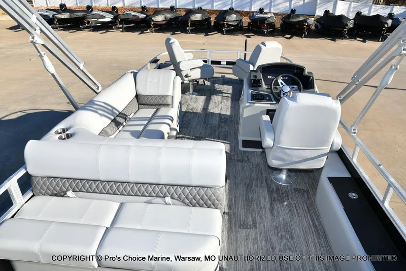 Slide: The Image of 2024 Ranger 220F boat interior with modern seating and steering console. - 8