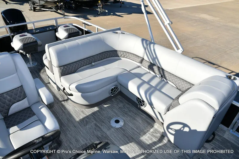 Slide: The Image of 2024 Ranger 220F boat interior with plush seating and modern design. - 9