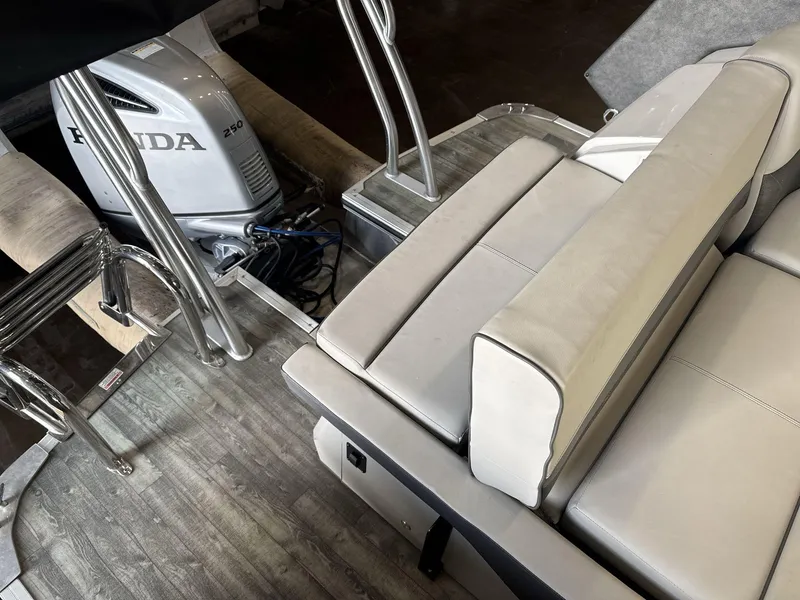 Slide: The Image of 2018 Crest Continental boat interior with Honda 250 outboard motor. - 16