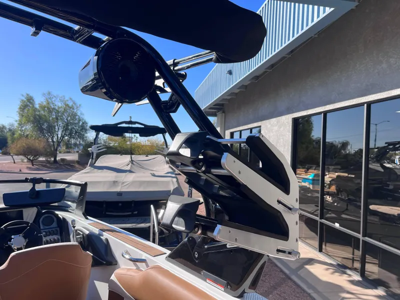 Slide: The Image of 2025 Supreme S240 boat interior with advanced audio system and sleek design. - 11