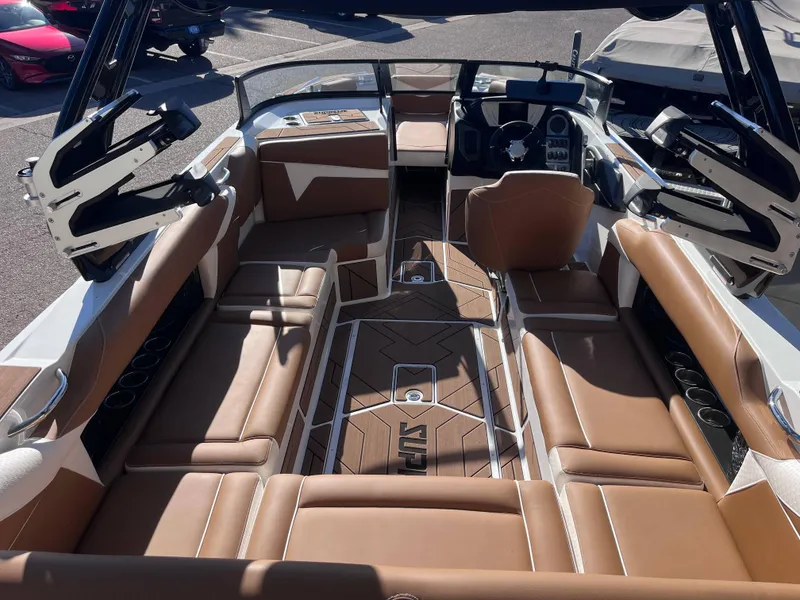 Slide: The Image of Luxurious 2025 Supreme S240 boat interior with tan leather seating and modern design. - 4