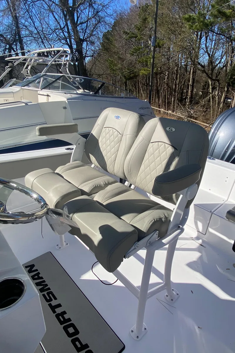 Slide: The Image of 2025 Sportsman Heritage 231 Center Console boat seats, featuring luxurious design and comfort. - 10