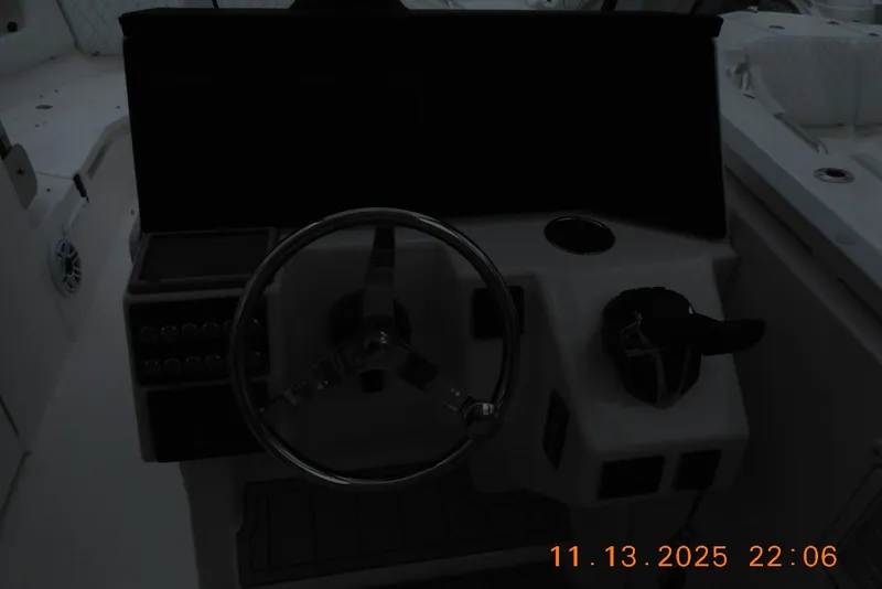 Slide: The Image of Steering console of 2025 Sea Fox 288 Traveler boat, featuring modern controls and dashboard. - 17