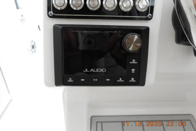 Slide: The Image of Control panel of 2025 Sea Fox 288 Traveler with JL Audio system. - 18