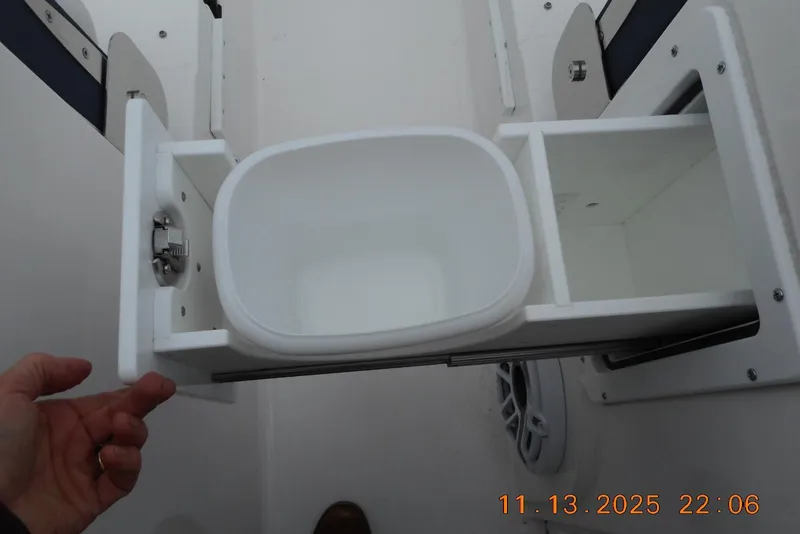 Slide: The Image of Pull-out storage compartment on a 2025 Sea Fox 288 Traveler boat. - 22