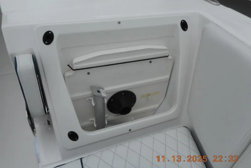 Slide: The Image of 2025 Sea Fox 288 Traveler boat interior storage compartment with quilted seating. - 30