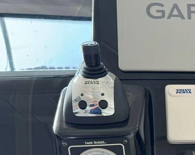 Slide: The Image of Joystick control on 2007 Tiara Yachts 4300 Sovran dashboard with Volvo Penta branding. - 22