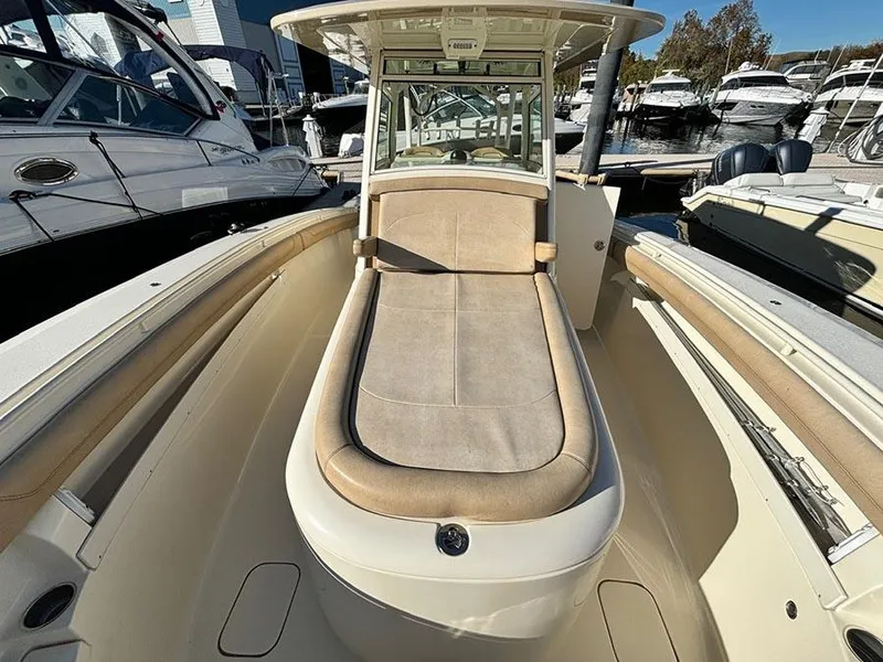 Slide: The Image of 2016 Scout 350 LXF boat with spacious deck and comfortable seating. - 16