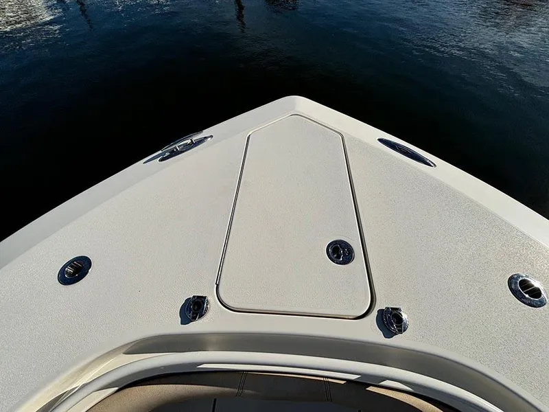 Slide: The Image of 2016 Scout 350 LXF boat bow with sleek design and stainless steel fixtures. - 19