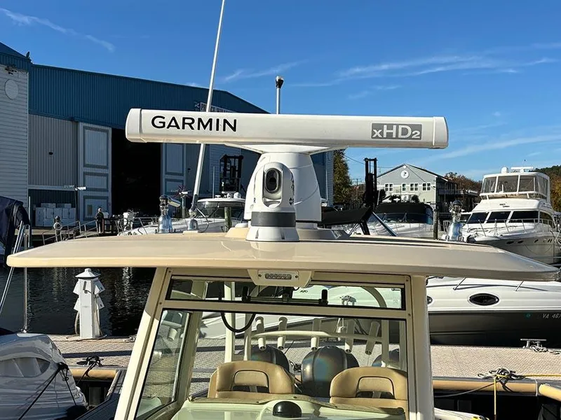 Slide: The Image of 2016 Scout 350 LXF boat with Garmin xHD2 radar at marina. - 32