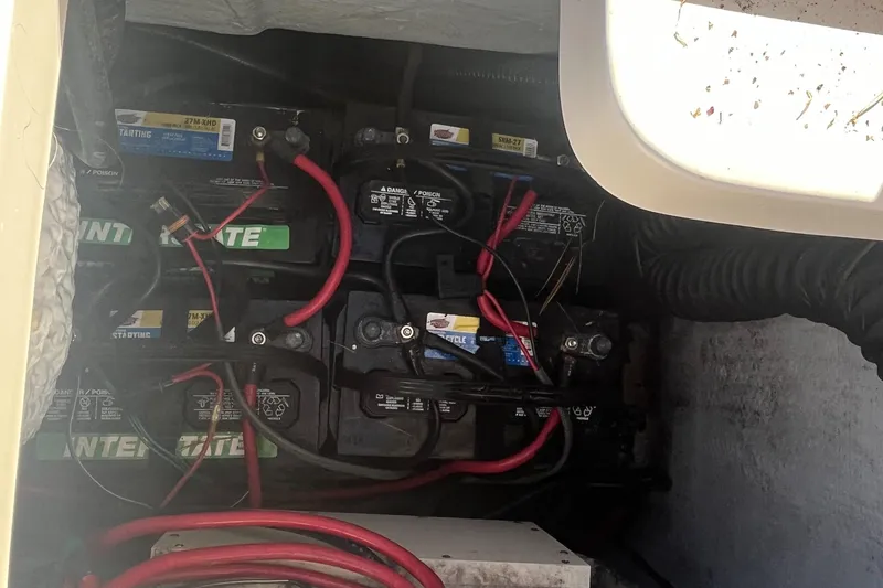 Slide: The Image of Battery compartment of 2003 Grady-White 330 Express boat with wiring. - 27