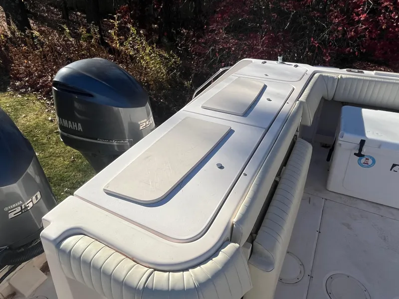 Slide: The Image of 2003 Grady-White 330 Express boat deck with Yamaha 250 engines. - 28