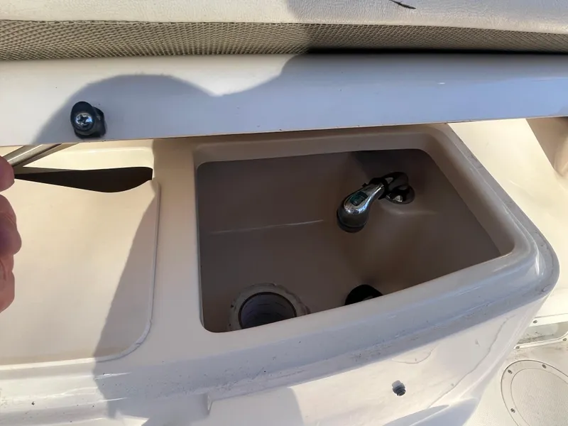 Slide: The Image of Storage compartment on a 2003 Grady-White 330 Express boat. - 31