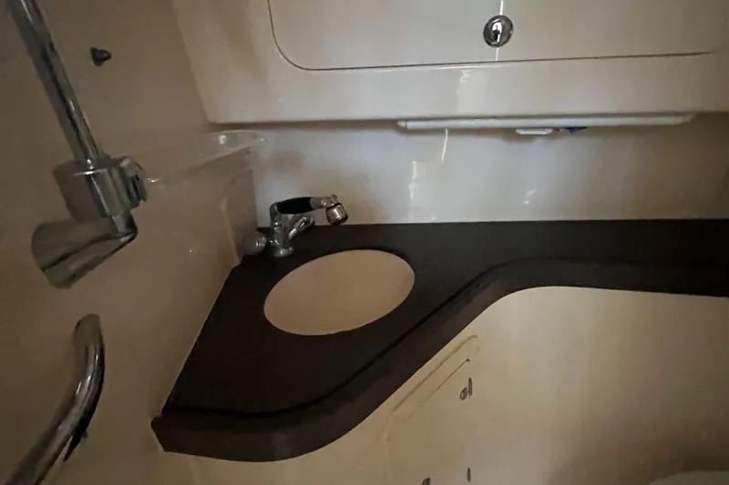 Slide: The Image of 2003 Grady-White 330 Express boat interior with sink and countertop. - 45