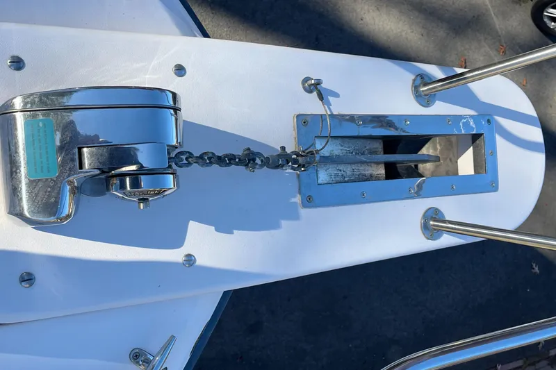 Slide: The Image of Anchor windlass on 2003 Grady-White 330 Express boat deck. - 50