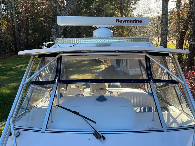 Slide: The Image of 2003 Grady-White 330 Express boat with Raymarine radar, front view. - 51