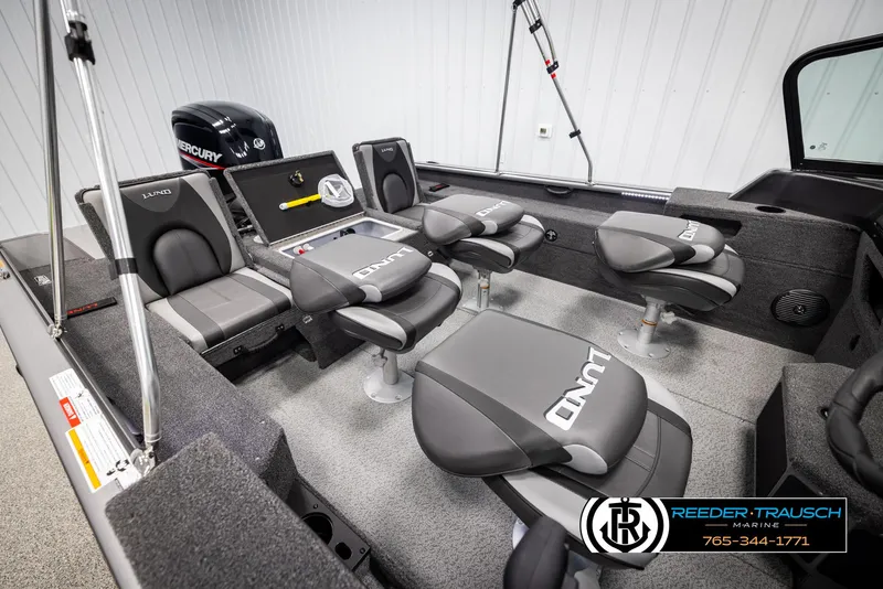 Slide: The Image of 2025 Lund 1775 Impact XS boat interior with seating and Mercury engine. - 23