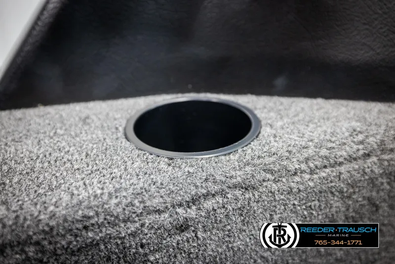 Slide: The Image of 2025 Lund 1775 Impact XS boat interior with cup holder detail. - 37