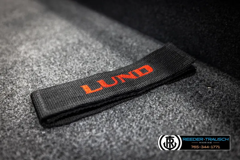 Slide: The Image of 2025 Lund 1775 Impact XS boat strap on carpeted surface. - 39