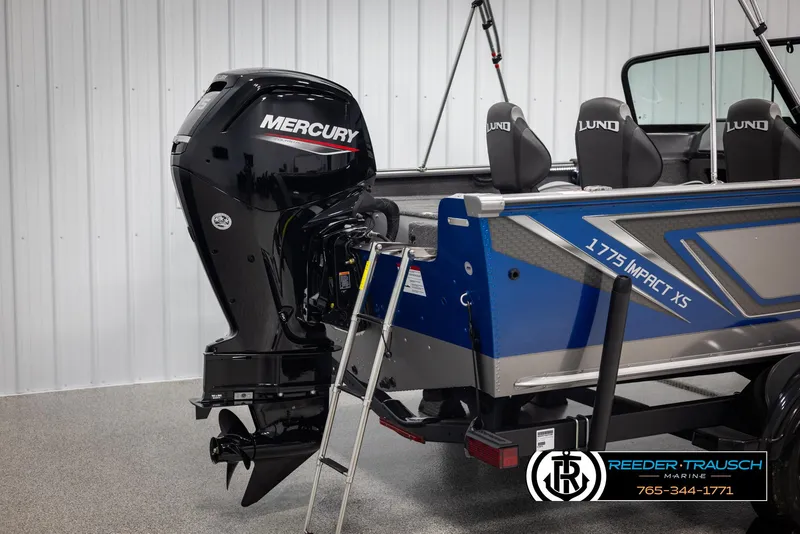 Slide: The Image of 2025 Lund 1775 Impact XS boat with Mercury engine in showroom. - 41