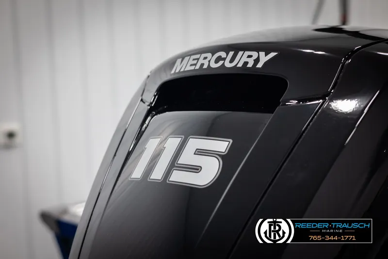Slide: The Image of Close-up of Mercury 115 outboard motor on 2025 Lund 1775 Impact XS boat. - 43
