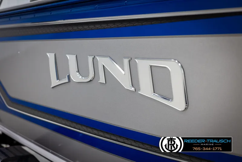 Slide: The Image of 2025 Lund 1775 Impact XS boat logo with blue and silver detailing. - 45