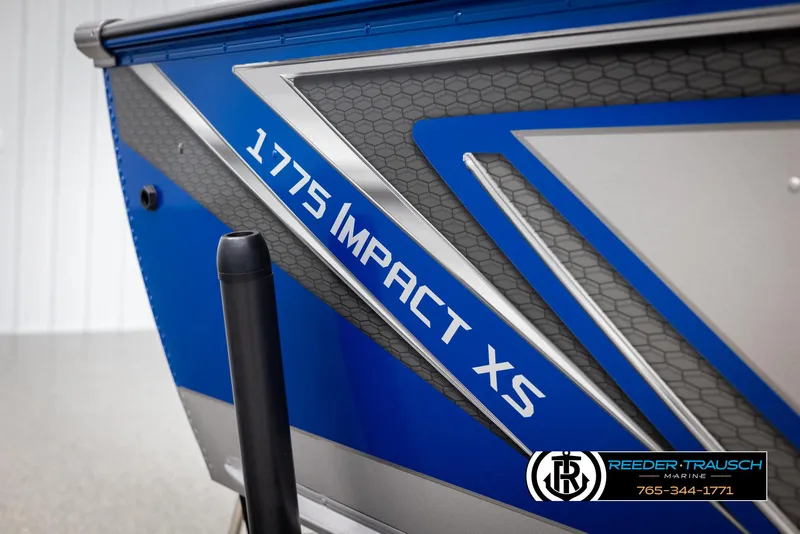 Slide: The Image of 2025 Lund 1775 Impact XS boat, blue and silver design, Reeder-Trausch Marine branding. - 46