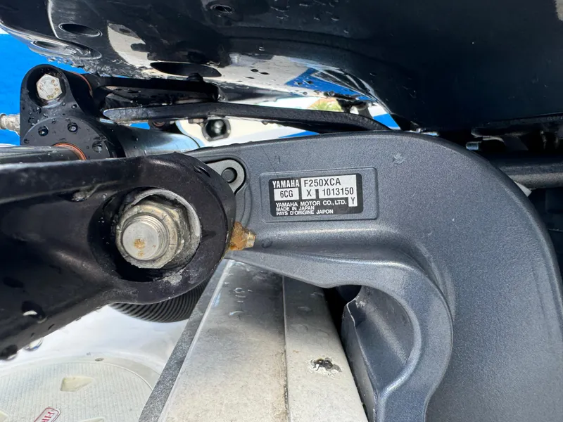 Slide: The Image of Close-up of Yamaha F250XCA engine part on 2017 Chaparral 250 Suncoast boat. - 24