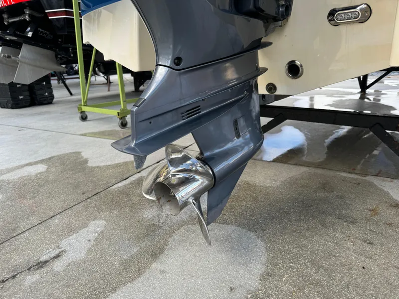 Slide: The Image of Close-up of 2017 Chaparral 250 Suncoast boat propeller on a concrete surface. - 6