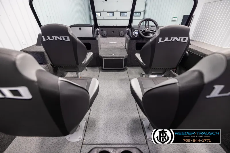Slide: The Image of Interior of 2025 Lund 1875 Impact XS boat with four seats and steering console. - 12
