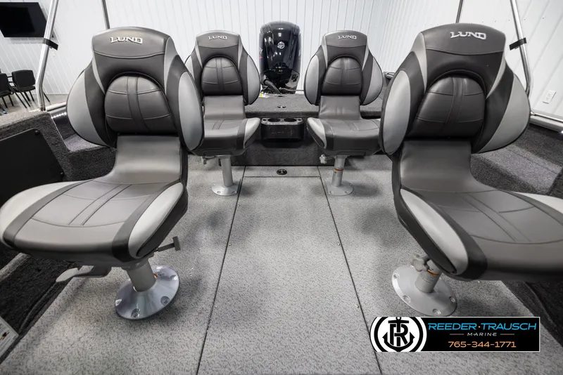 Slide: The Image of Interior of 2025 Lund 1875 Impact XS boat with four gray seats. - 16