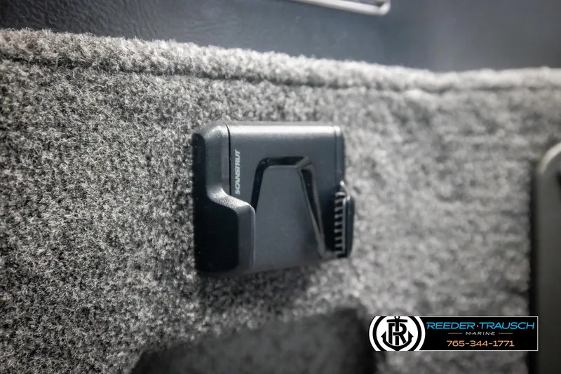 Slide: The Image of 2025 Lund 1875 Impact XS interior detail with Scanstrut mount on carpeted surface. - 37