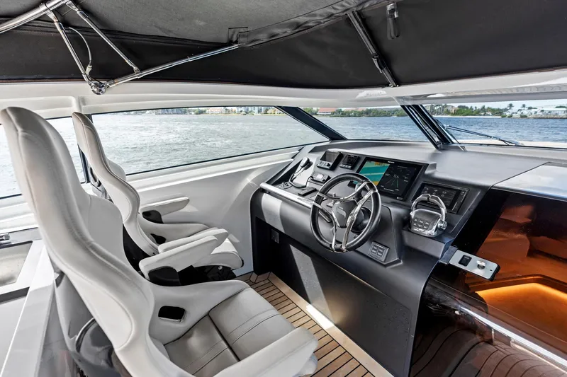 Slide: The Image of Interior of 2021 Sichterman Libertas 54 yacht, featuring modern helm and luxurious seating. - 22