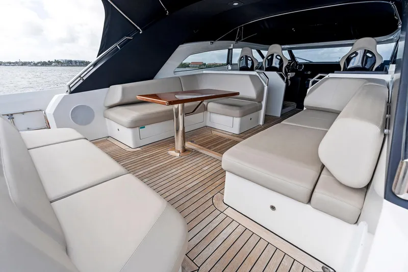 Slide: The Image of Luxurious 2021 Sichterman Libertas 54 yacht interior with elegant seating and wooden flooring. - 36